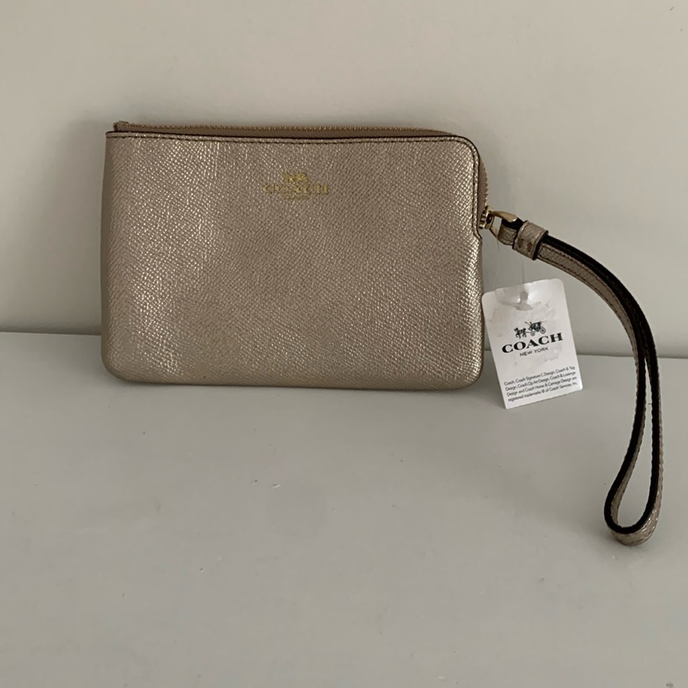Coach Gold leather wristlet. NWT